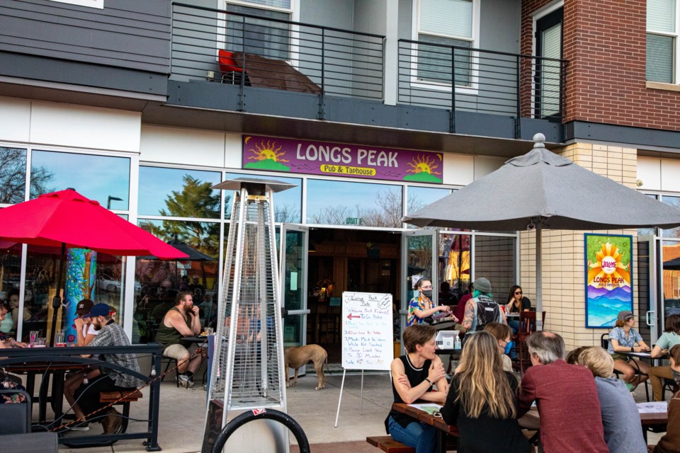 Long's Peak pubs patio is bustling on a Friday evening