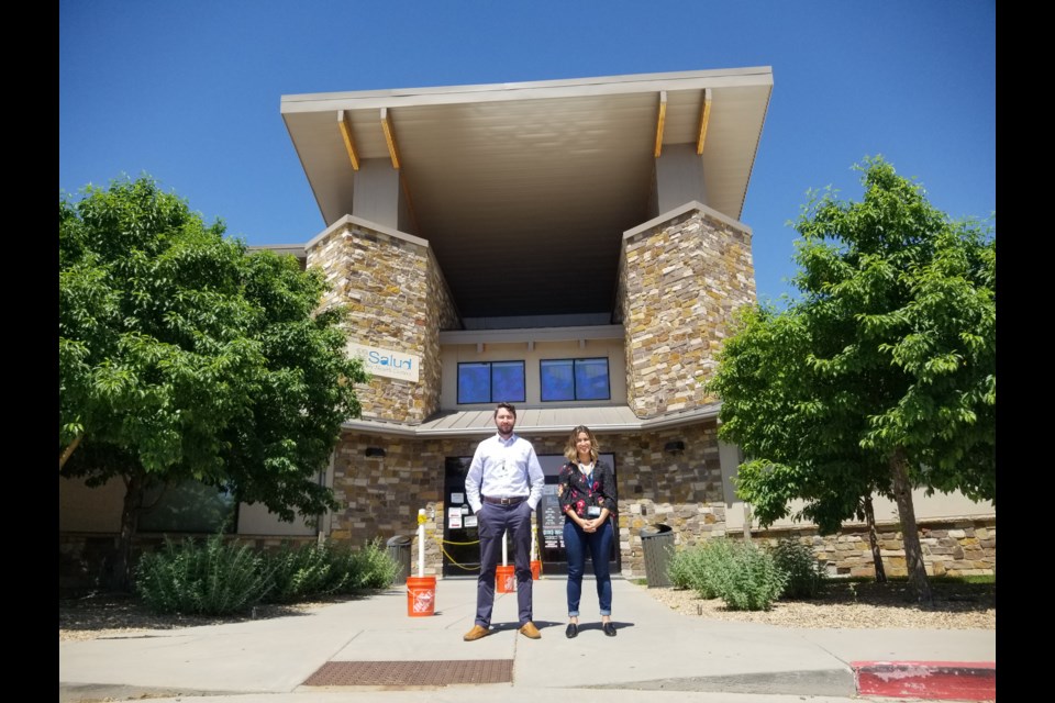 Marc Scanlon and Bea Garrity offer legal advice at Salud Family Health Centers' Commerce City, Colorado, clinic, one of more than 450 medical-legal partnerships nationwide. (Jakob Rodgers for KHN)