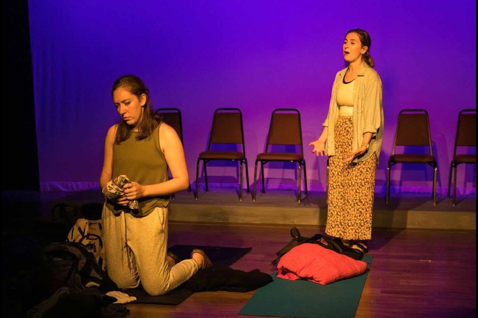 Lauren Bergen (right) and Emma Luxemburg perform in Wagner Collegeâs production of âSmall Mouth Sounds.â Performing arts professor Felicia Ruff chose the play because it requires the actors to be mostly silent. (Karen O'Donnell)
