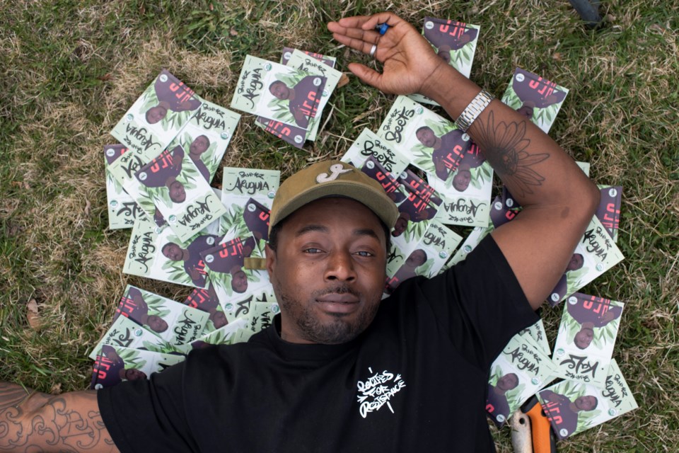 Ietef âDJ Cavemâ Vita, a vegan rapper in the metro Denver area, encourages people of color to eat healthier by growing their own vegetables. He sells his own line of kale, beets and arugula seeds. (Rachel Woolf for KHN)