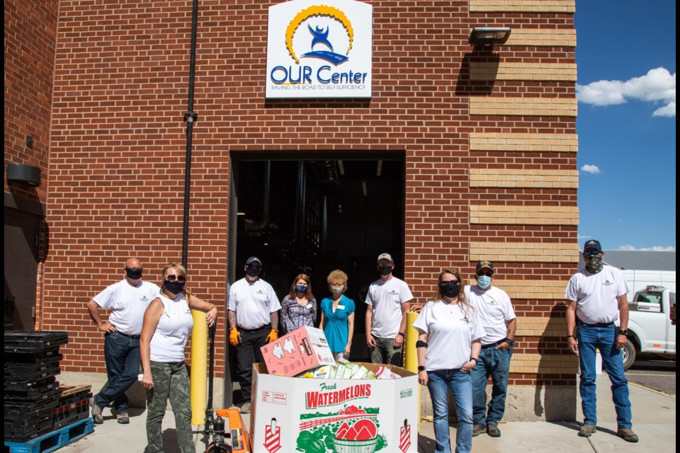 In May, employees across 23 of Aggregate Industries' work sites collected a whopping 6,500 pounds of non-perishable foods and household goods and chose the OUR Center in Longmont. 
(Photo courtesy of Aggregate Industries)