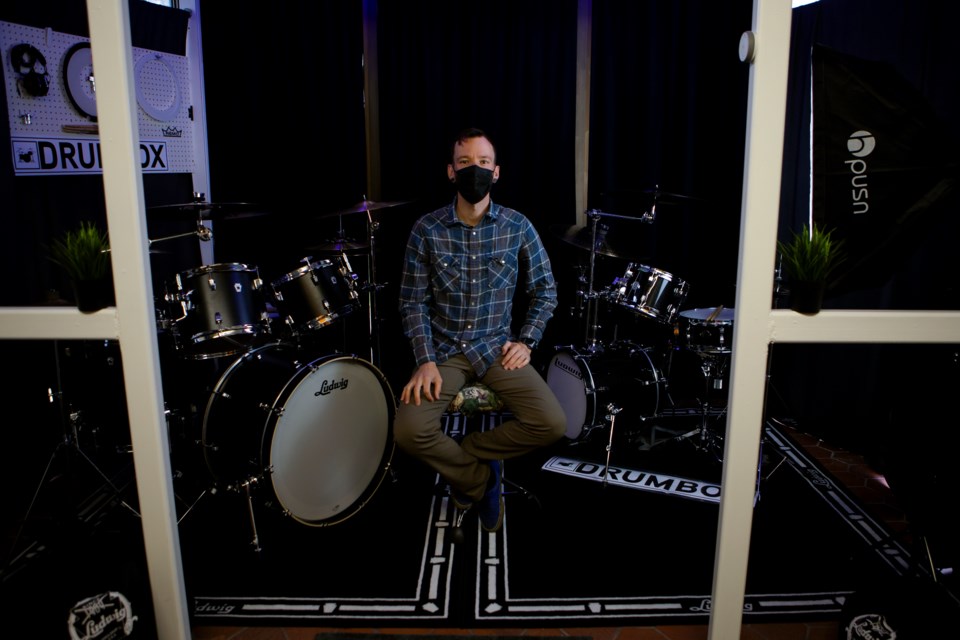 Drumbox owner Jake Schell sits in the Longmont studio on May 10. The Longmont Drumbox opened on May 5 and is the second location for the business that launched in Lafayette in 2019. Photo by Ali Mai | ali.mai.journo@gmail.com