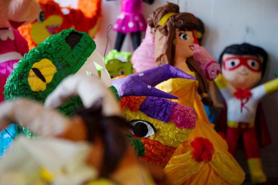 A variety of pinatas displayed at Dulceria Bombon on July 19. The candy and party store offers several pinatas but can also order custom designs from a vendor in Mexico. Photo by Ali Mai | ali.mai.journo@gmail.com