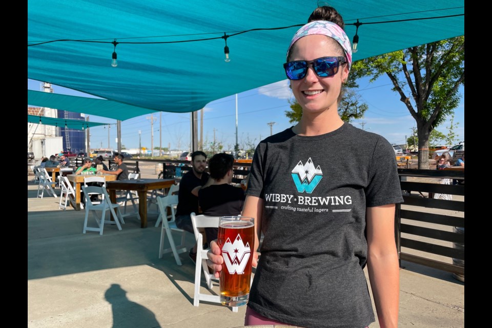 Teryn  Weidermann serves up a cold Volksbier Amber Vienna Lager.