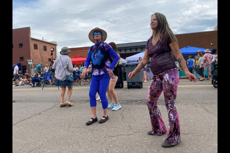 Community members enjoy the Creative Crawl in downtown Longmont on May 14, 2022.
