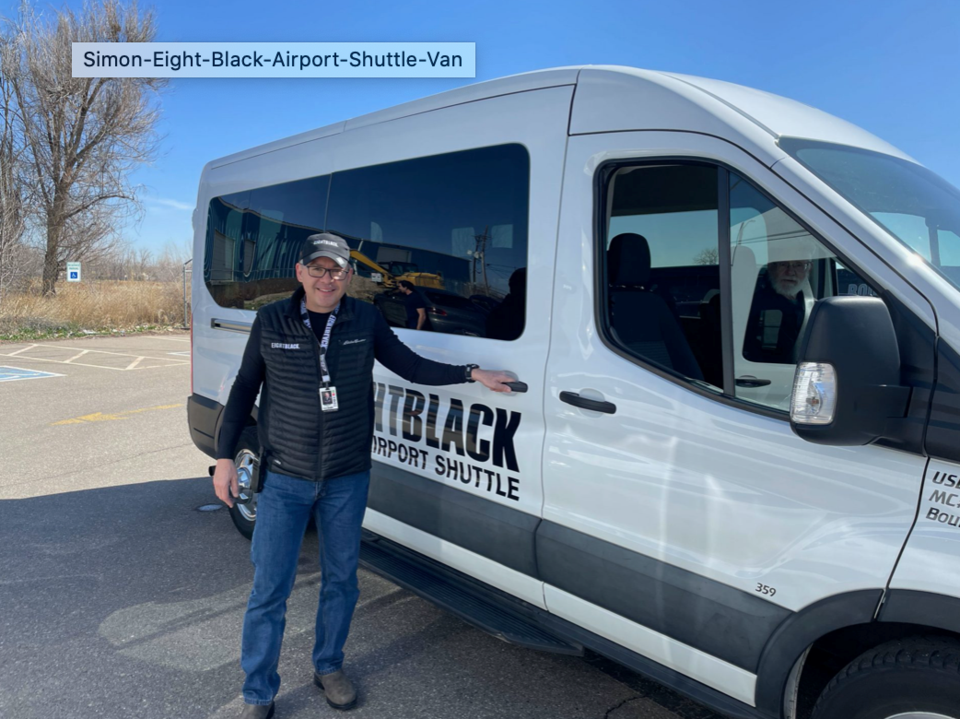 Eight Black Airport Shuttle