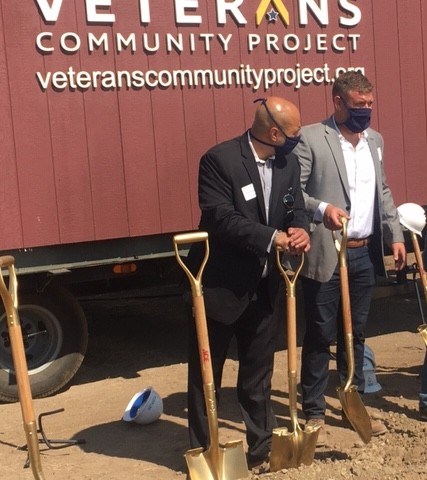 Two of the Veterans Community Project founders, Vincent Morales, left, and Bryan Meyer, prepare to turn the ceremonial first shovels of dirt at the Longmont Village site on Aug. 27, 2020.
(Photo by Julie Baxter)