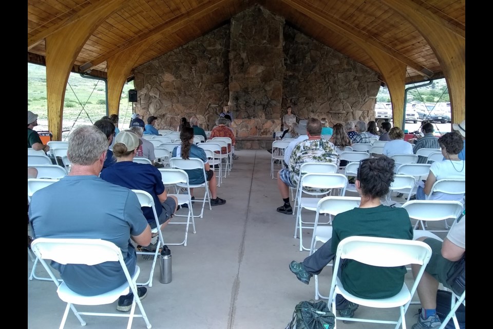 Janis Whisman, BCPOS real estate manager and interim co-director, introduces Therese Glowacki, manager of the BCPOS resource management division, at the July 23 forum for BCPOS director finalist candidates.