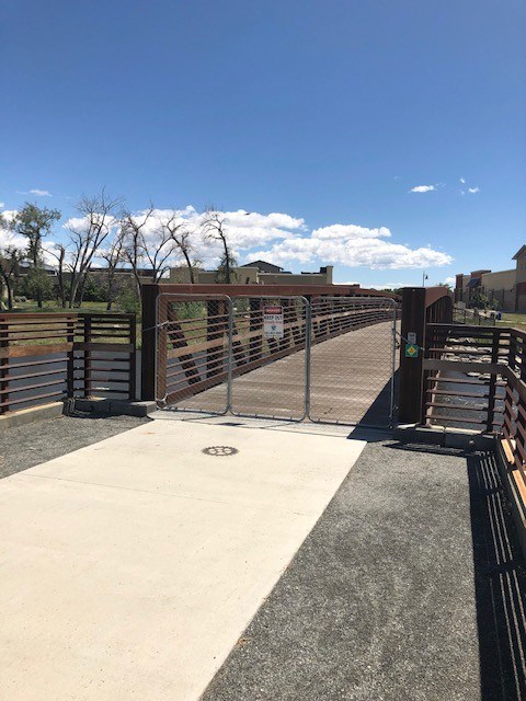 Fencing now blocks access to a pedestrian bridge in the Dickens Farm Nature Area from which illegal jumping has been occurring. 
(Photo courtesy of city of Longmont)