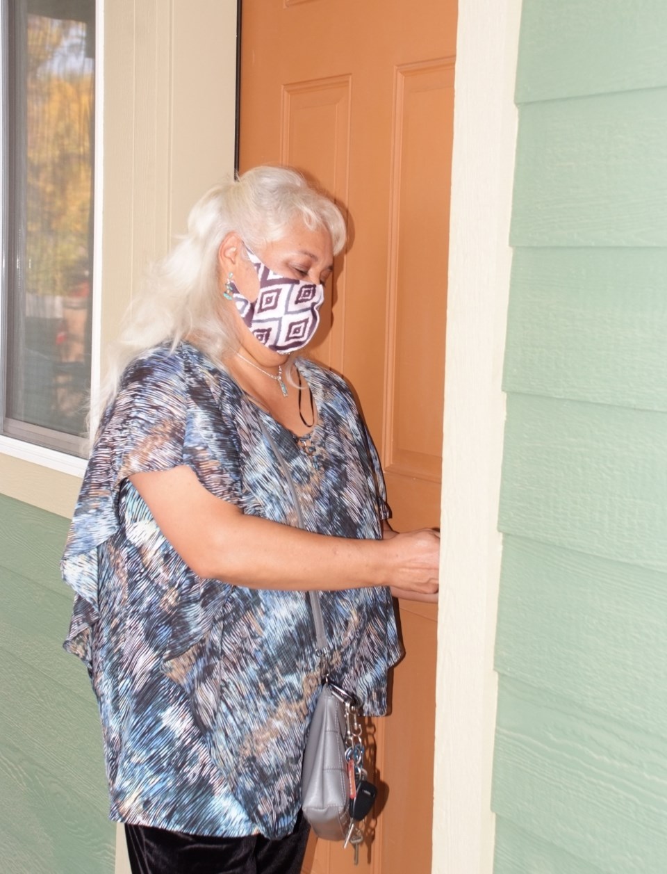 Ana Murango opens door to her first home.