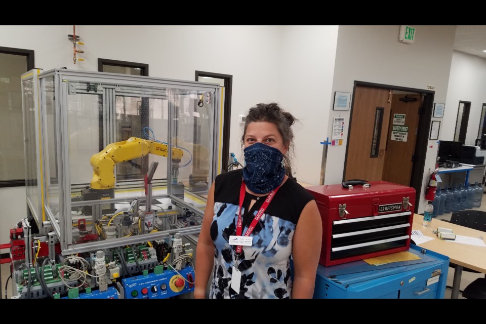 Nicole Gervace, program coordinator of advanced technology at Front Range Community College, stands in the lab for automation and technology in the Center for Integrated Technology on Monday.
(Photo by Monte Whaley)
