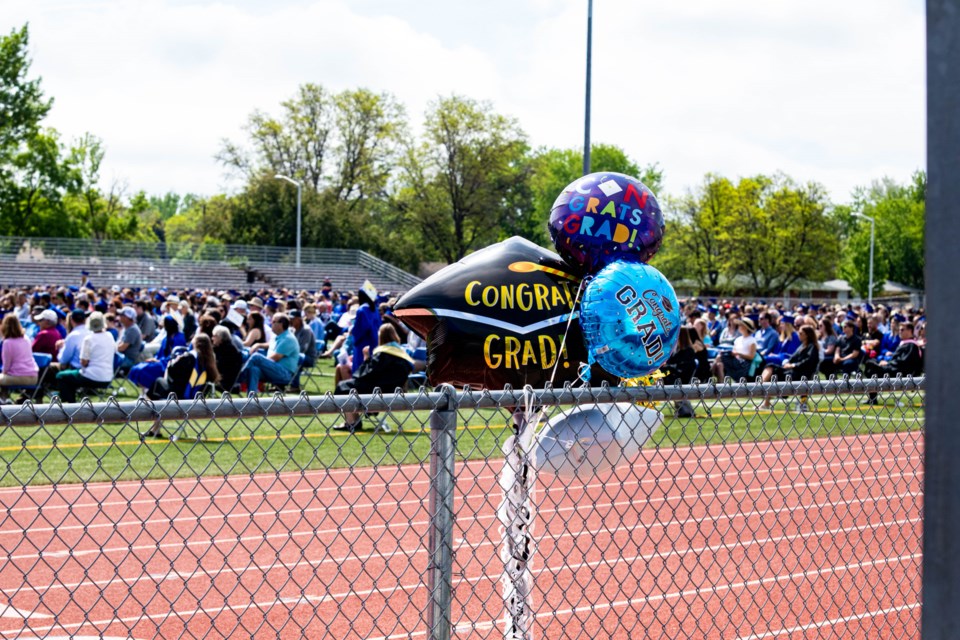 LHS field crowded with family, friends and well-wishers for the graduating class of 2021.