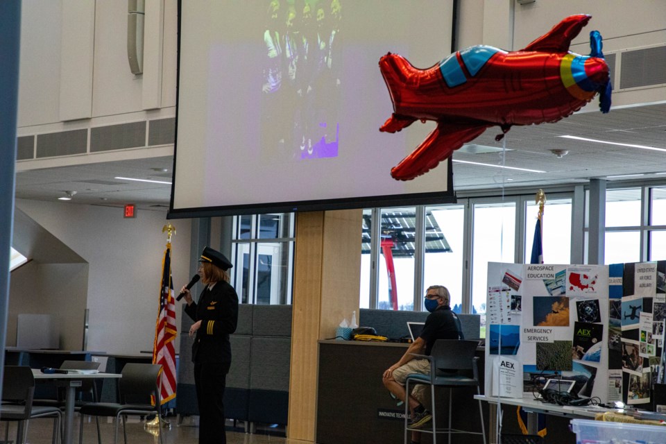 Delta Airlines Pilot Nancy Hultgren speaks to the group about commercial airline piloting.