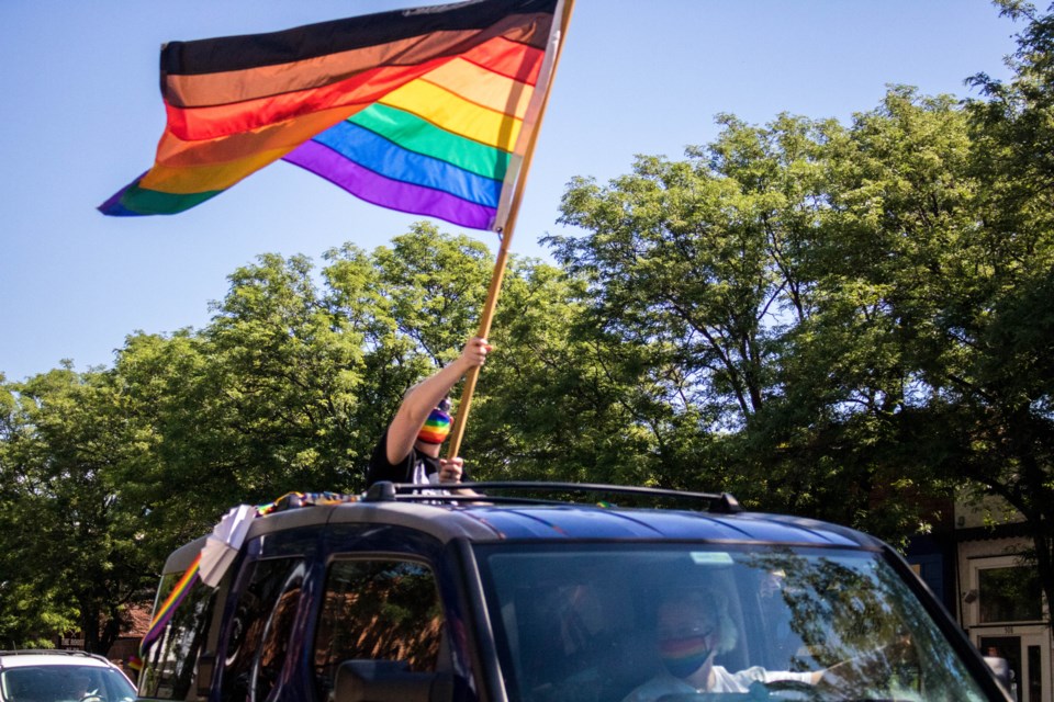Participants let their pride shine from sunroofs, truck beds and car windows during the Longmont Pride motorcade on June 27, 2020. 
(Photo by Matt Maenpaa)