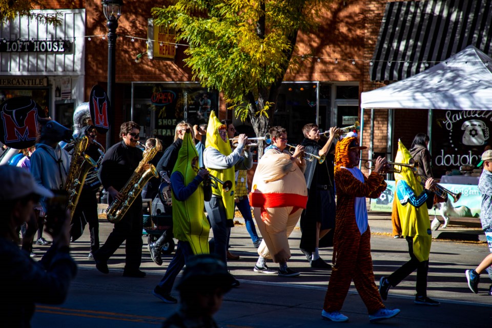 Longmont families packed the streets with clever and creative costumes to walk through downtown in the 2021 Longmont Halloween Parade.
