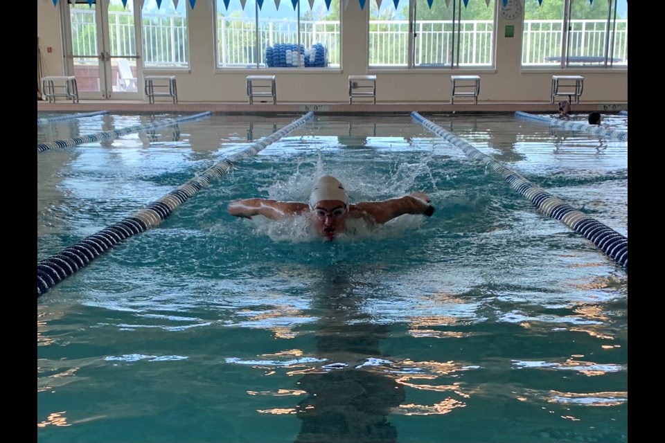 Swimmer of the Year Pierce Bigelow in the pool on Jul. 30