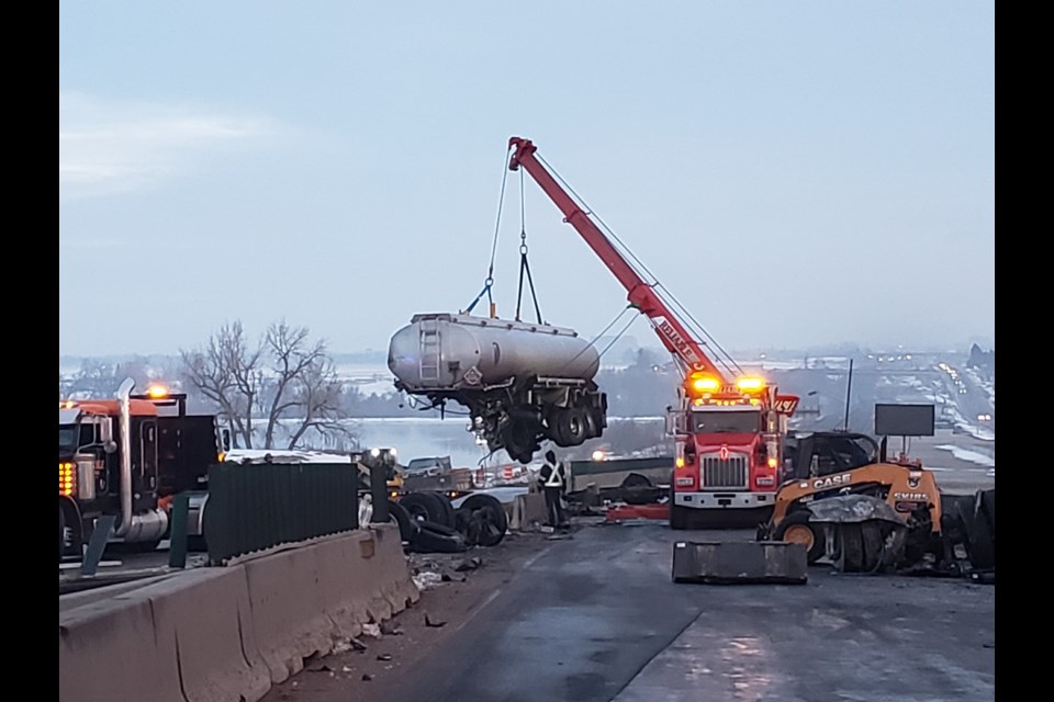 Fuel tanker being removed from crash on U.S. 25 on March 20, 2021