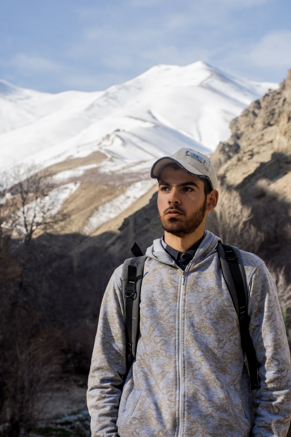 standing on a mountain