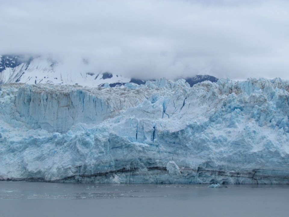 The face of Hubbard Glacier in the midst of calving. Photo by Teri Beaver