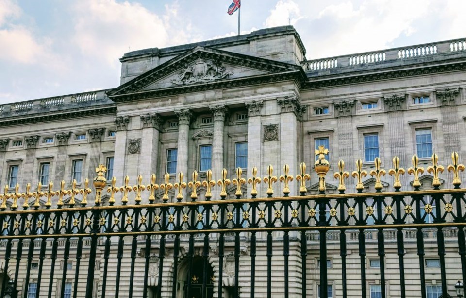 The flag above Buckingham Palace shows that the queen is not at home. Photo by Teri Beaver.