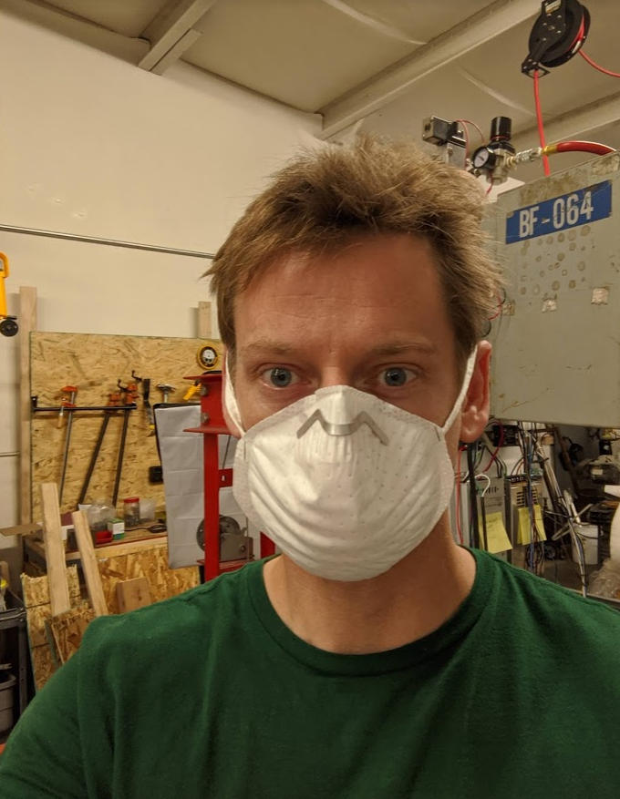 Austin Reid wearing a test mask made on the Longmont Distributed Mask Press