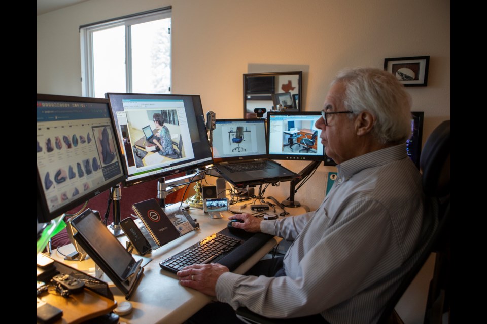 Owner of the ergonomic consulting company The Chasen Group, Craig Chasen sits at his desk on March 17.