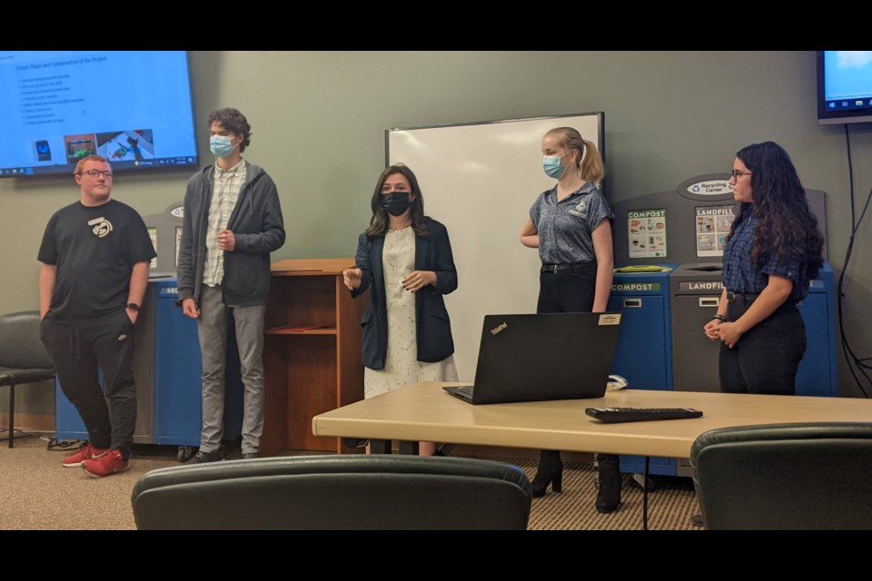 Innovation Center data science team students Mark Raehal, Mateo Bandera, Taryn McDermid, Bethany Lonsinger and Jenna Watson present their data and work on reintroducing northern redbelly dace to the St. Vrain watershed to wildlife biologists with Boulder County Parks and Open Space.
