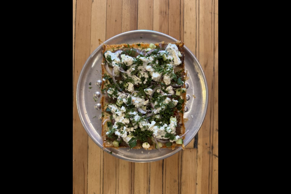 A slice of gyro pizza