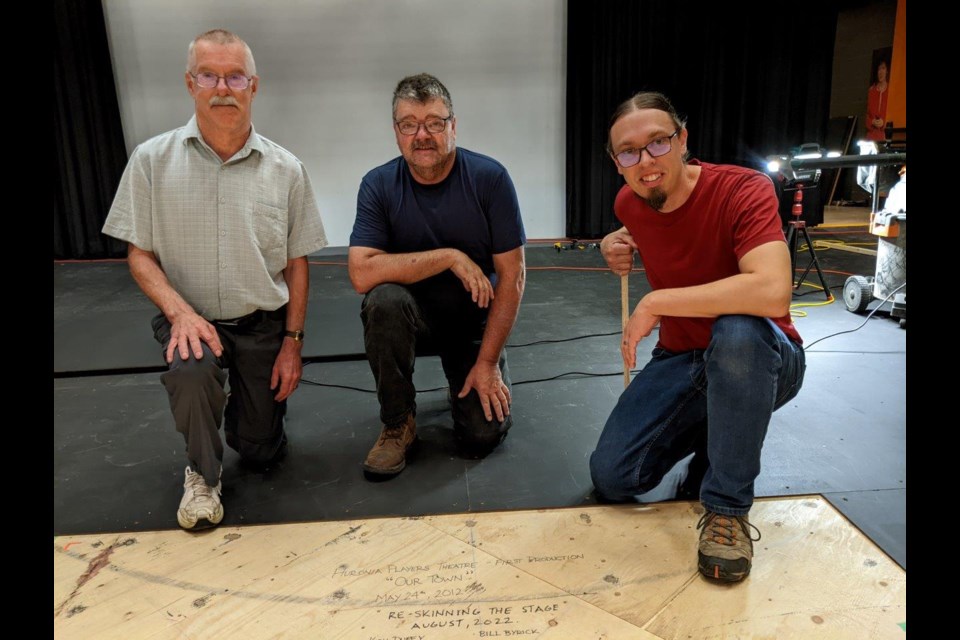 Earlier this year, volunteers worked to get the stage ready for the upcoming season. Daryl Purdie, Kirk Duffy and Jonathan Killing, give a thumbs up the tribute that will be locked under the top skin of the stage.