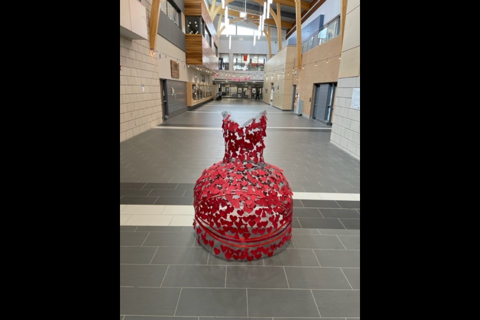 GBDSS staff and students created this installation in honour of Red Dress Day and to raise awareness about Murdered and Missing Indigenous Women, Girls and Two-Spirit People. Students learned about MMIW and wrote something they learned, or a positive message of solidarity on red hearts, dresses and butterflies. Over the week, the 'empty' form of the dress became filled in brilliant red. Visual arts teacher Kristen Keller and Indigenous graduation coach Aimee Grenier spearheaded the initiative.
