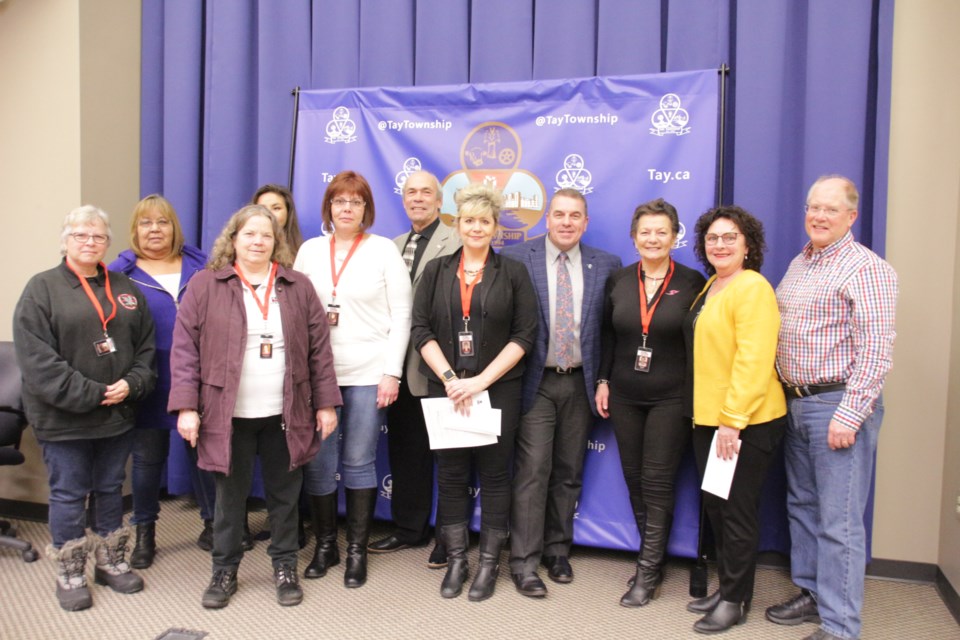 Volunteers with Crime Stoppers of Simcoe, Dufferin, Muskoka, were given $1,000 at the grants distribution held Wednesday night at Tay Township's council meeting. Mehreen Shahid/MidlandToday