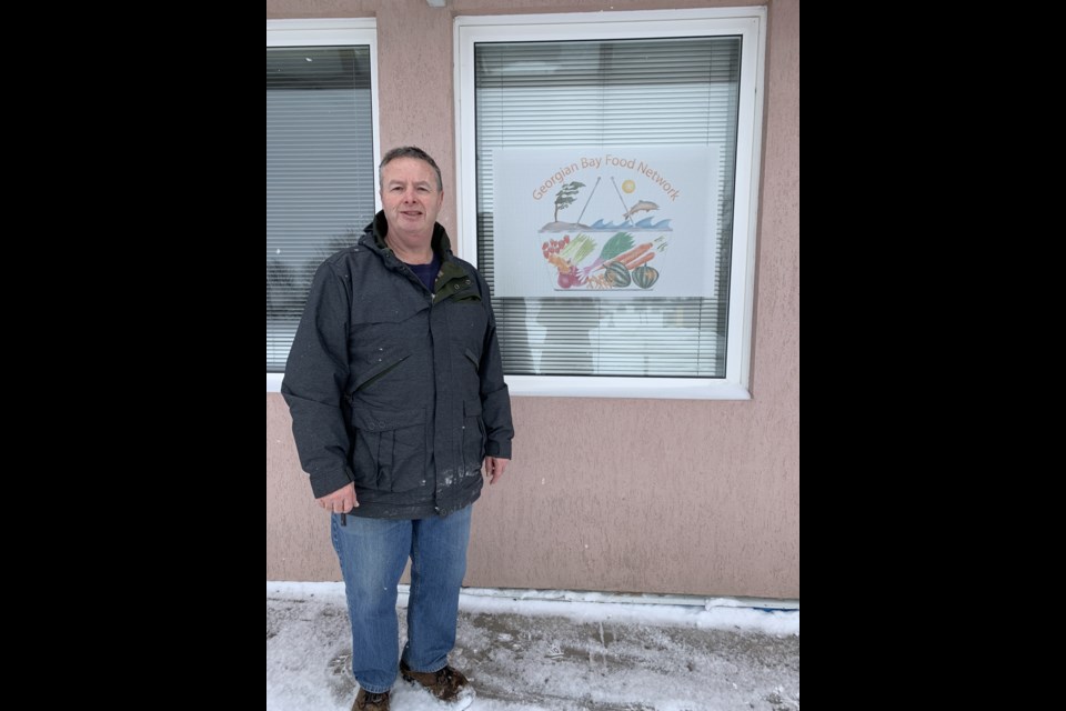 Paul Stack stands outside the Georgian Bay Food Network.
