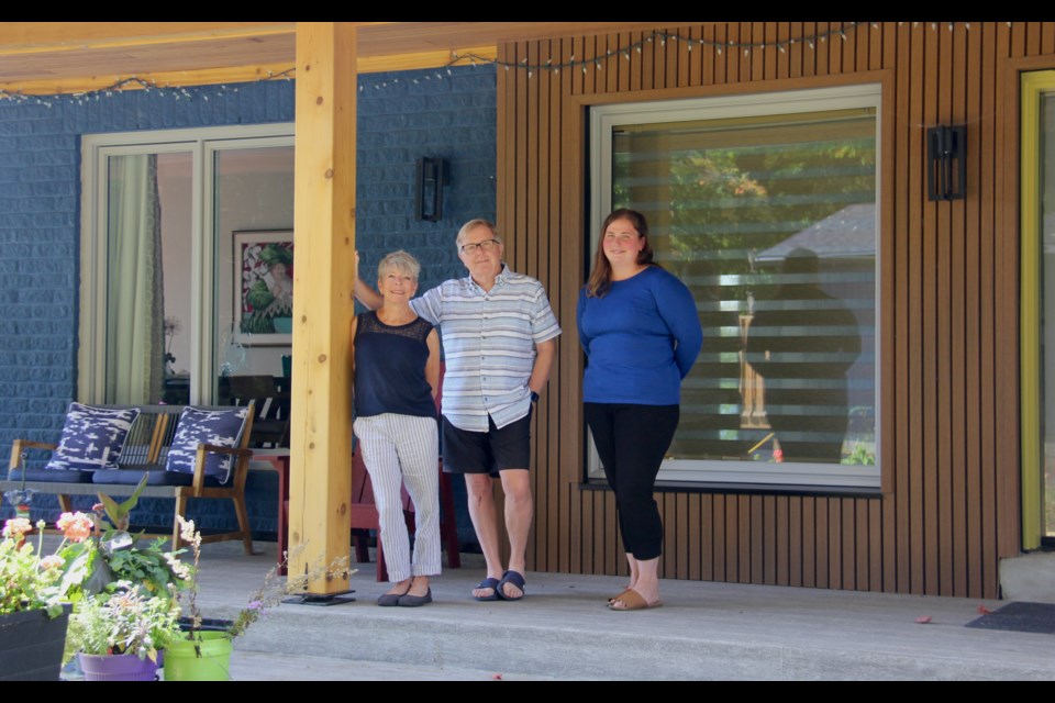 Carol Lavoie and Jonathan Hackett have their Midland home on this this year's Big Brothers Big Sisters of North Simcoe's Showcase of Homes Tour this Saturday. They are seen with Haylie Taylor, fundraising and community development coordinator for BBBS.