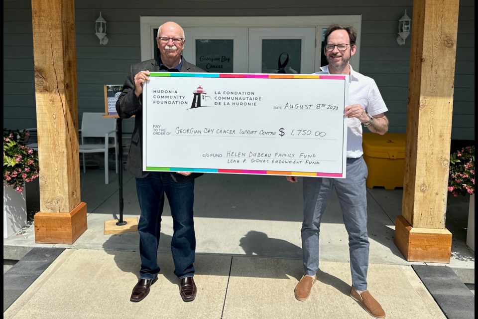 Scott Warnock, left, executive director of the Huronia Community Foundation, is shown with Paul Eichhorn, manager of fundraising and outreach with the Georgian Bay Cancer Support Centre.