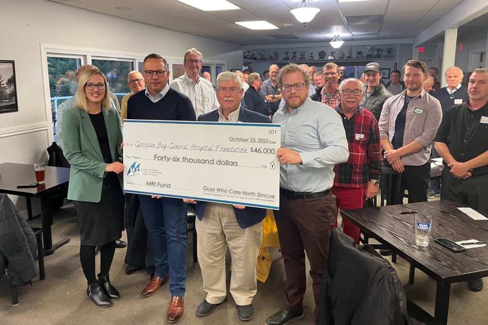GBGH officials accept the Guys Who Care donation. Pictured from left to right are: Jesse Dees, senior key relationships officer, GBGH Foundation; Mike Thor, member of Guys Who Care; Bernie Uhlich, vice-chair, GBGH Board of Directors; Matthew Lawson, president & CEO, GBGH.