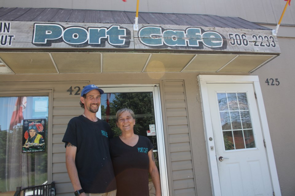 Port Café co-owners Shawn Haines and Linda Nielsen opened their new restaurant’s doors in the middle of the COVID-19 pandemic in May 2020. Knowing how people were struggling, they set up a suspended board system that provides meals for those in need paid for by caring community members.