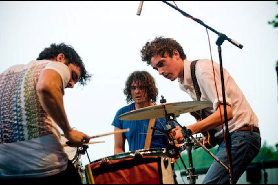 Steve Hamelin, Mitch DeRosiers, and Luke Lalonde play an outdoor music festival in this undated band photo circa 2006-2008.