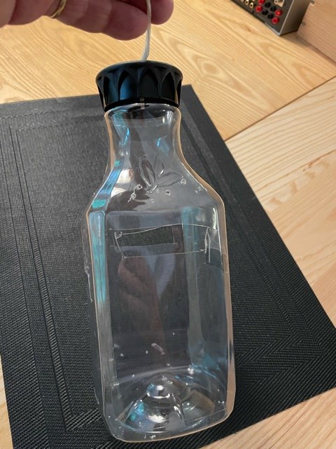 A large plastic bottle is a key part of the trap.