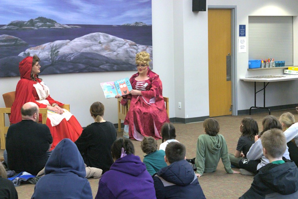 Drag queen storytime was one of the events hosted by the Midland Public Library as part of its March break lineup and featured entertaining stories and songs provided by Jemm Doshay, right, and Queenie ZaDahl, of Haus of Devereaux.