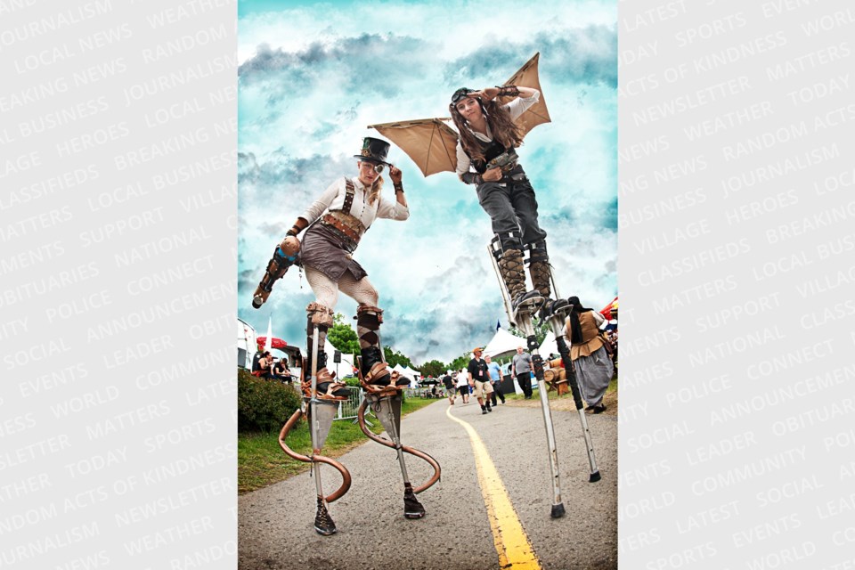 Créations In Vivo theatre troupe, back as steamfunk stilt walkers for this year's Festival du loup.