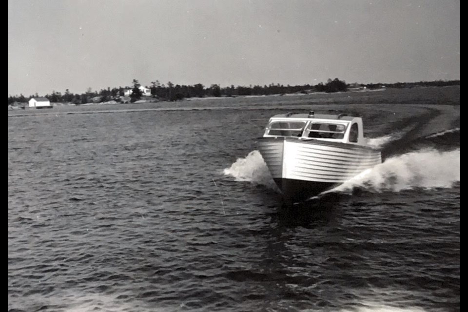  This is a typical wooden Norse Boat designed and built by Eric and Jan Ulrichsen of the Norse Boat and Ski Company that operated in Penetanguishene from the 1940s through to the 1960s. Undated photo.