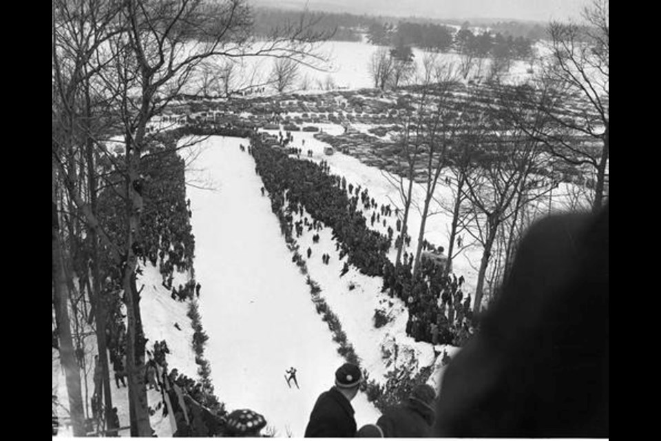 Taken during the Provincial Ski Jumping Championship, this photo shows part of the large crowd that turned out for the meet. With more onsite parking and the help of the provincial police and a provost corps from Base Borden, organizers were able to keep traffic flowing freely.