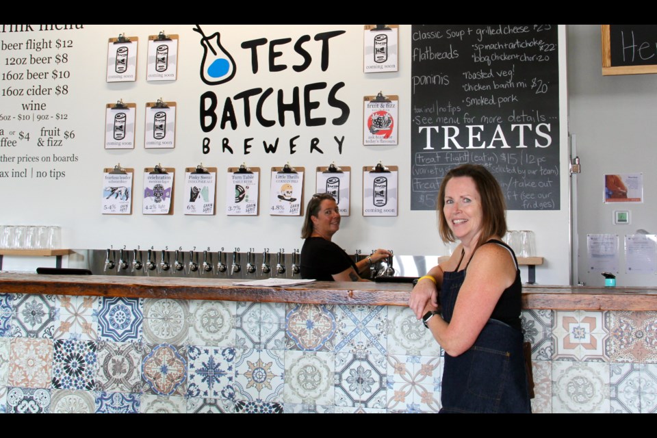 Lesley Tripp, right, runs a support program called Journey of Hope at the Georgian Bay Cancer Support Centre. She is pictured with Robin Elliott at Test Batches Brewery, which she and her husband Jamie opened last year.