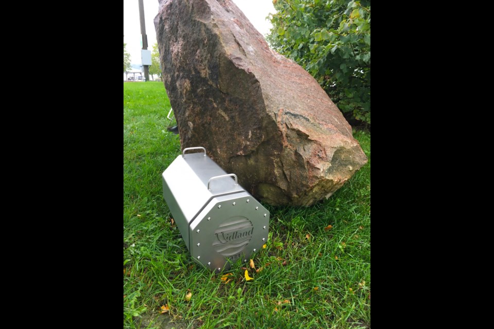 The time capsule next to the large rock that will cover the burial location until 2071.