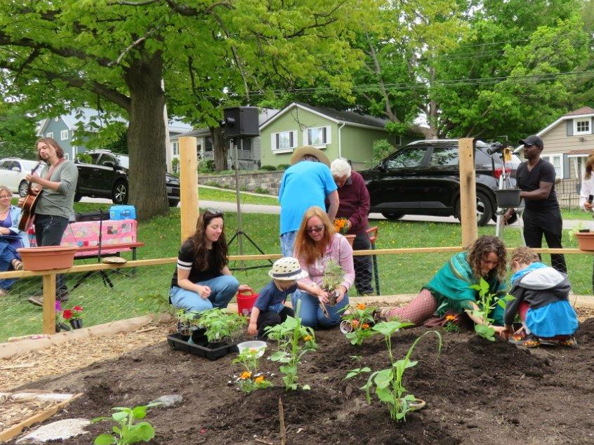 Local residents plant seeds, flowers and vegetables at the Waubaushene community garden.
