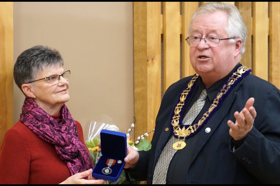Mayor Stewart Strathearn presented the Sovereign's Medal for Volunteers to Bryde Desroches at last week's council meeting. Mehreen Shahid/Midland/Today            