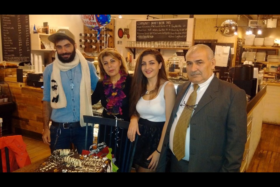 The Amin family celebrates Zarmig’s first birthday in Canada. Zarmig Amin came to Canada as a Syrian refugee by herself. Her brother and parents joined her a short time later. From left to right: Katchik, Zovig, Zarmig, Ibrahim Amin.