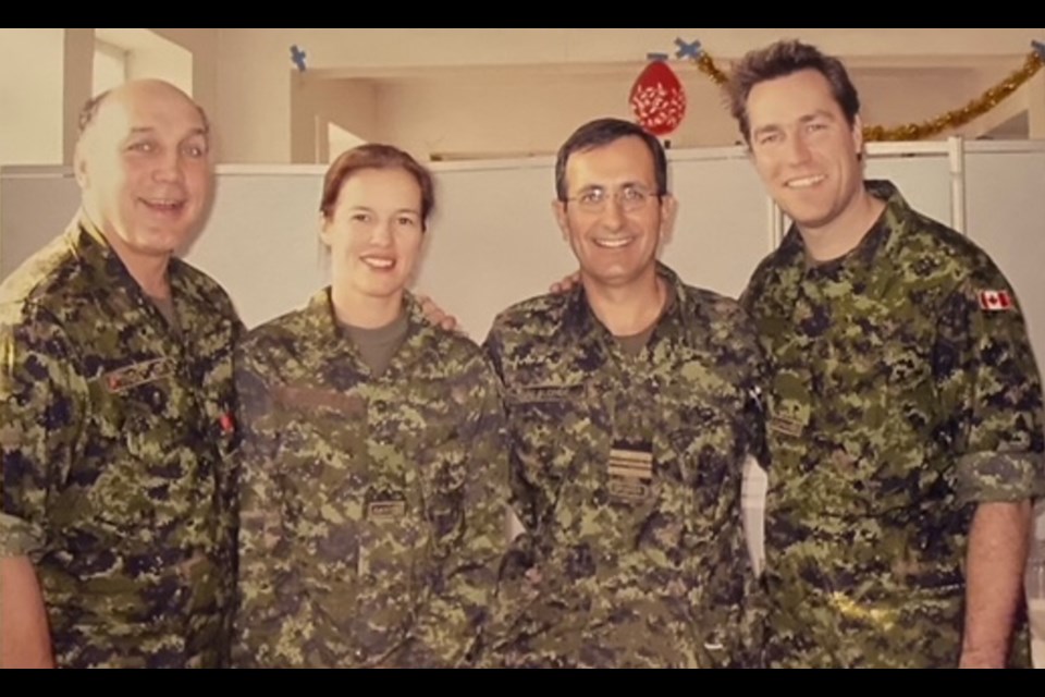 Retired Major John Lalonde coordinated Operation Hockey Heroes in 2003 escorting NHL hockey celebrities into Bosnia, the Persian Gulf and Afghanistan for a seven-day visit with over 2,000 Canadian troops. From left: Dave 'Tiger' Williams, Cassie Campbell, Major John Lalonde and Kirk McLean. 