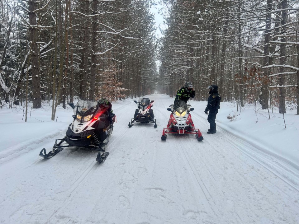 20250117-sgb-opp-snowmobiles1
