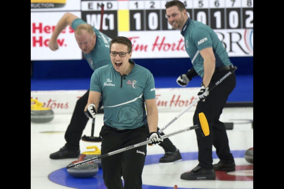 Teammates celebrate after Wayne Middaugh's final shot in a Brier win over Mike McEwen at the 2021 Tim Hortons Brier. Barrie is hoping to host the 2023 event.